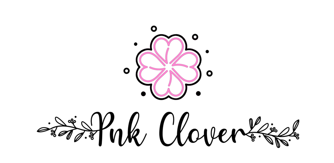 Pnk Clover Logo, Four leaf clover with a pink inside and black perimeter and the text Pnk Clover below in black cursive font